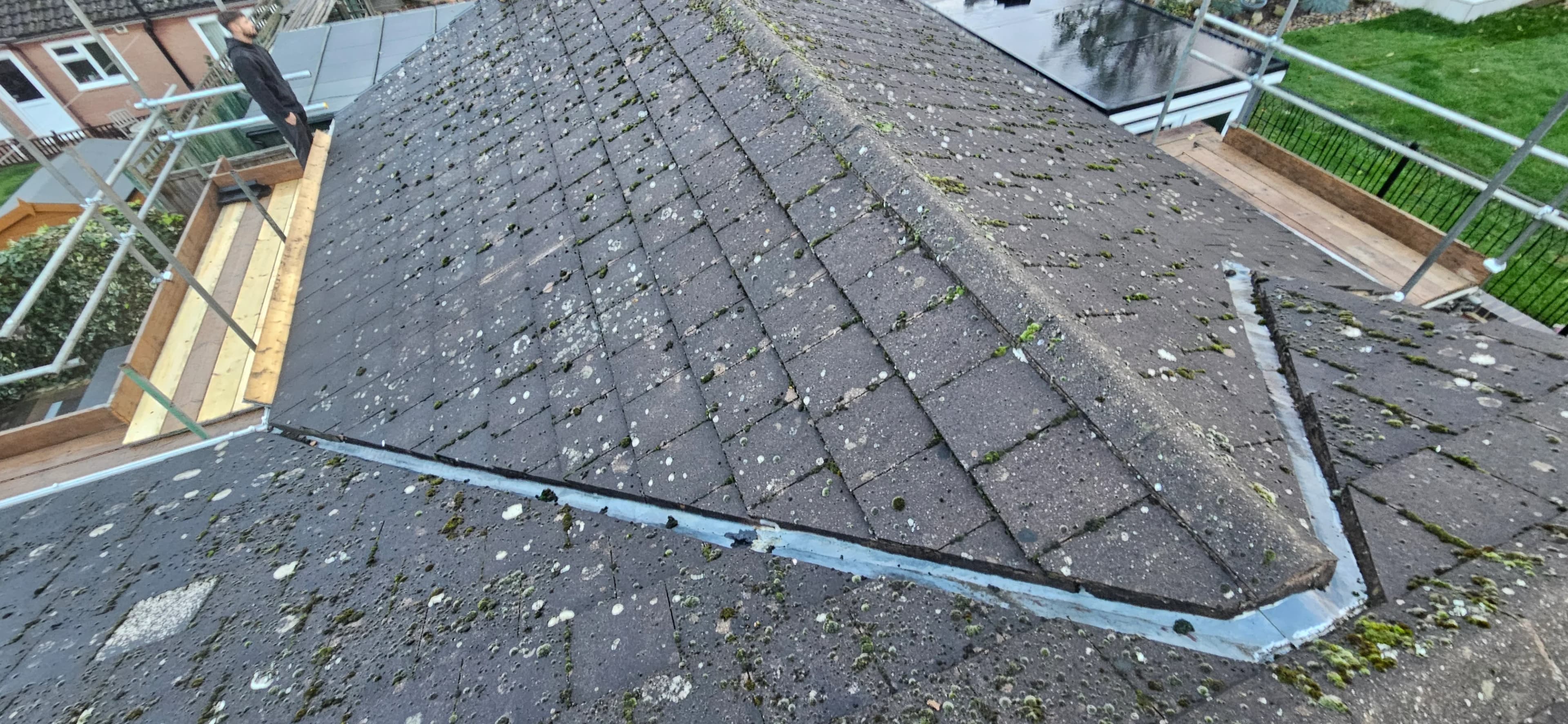 Slate roof ridge and hip detail on a re-roofed property