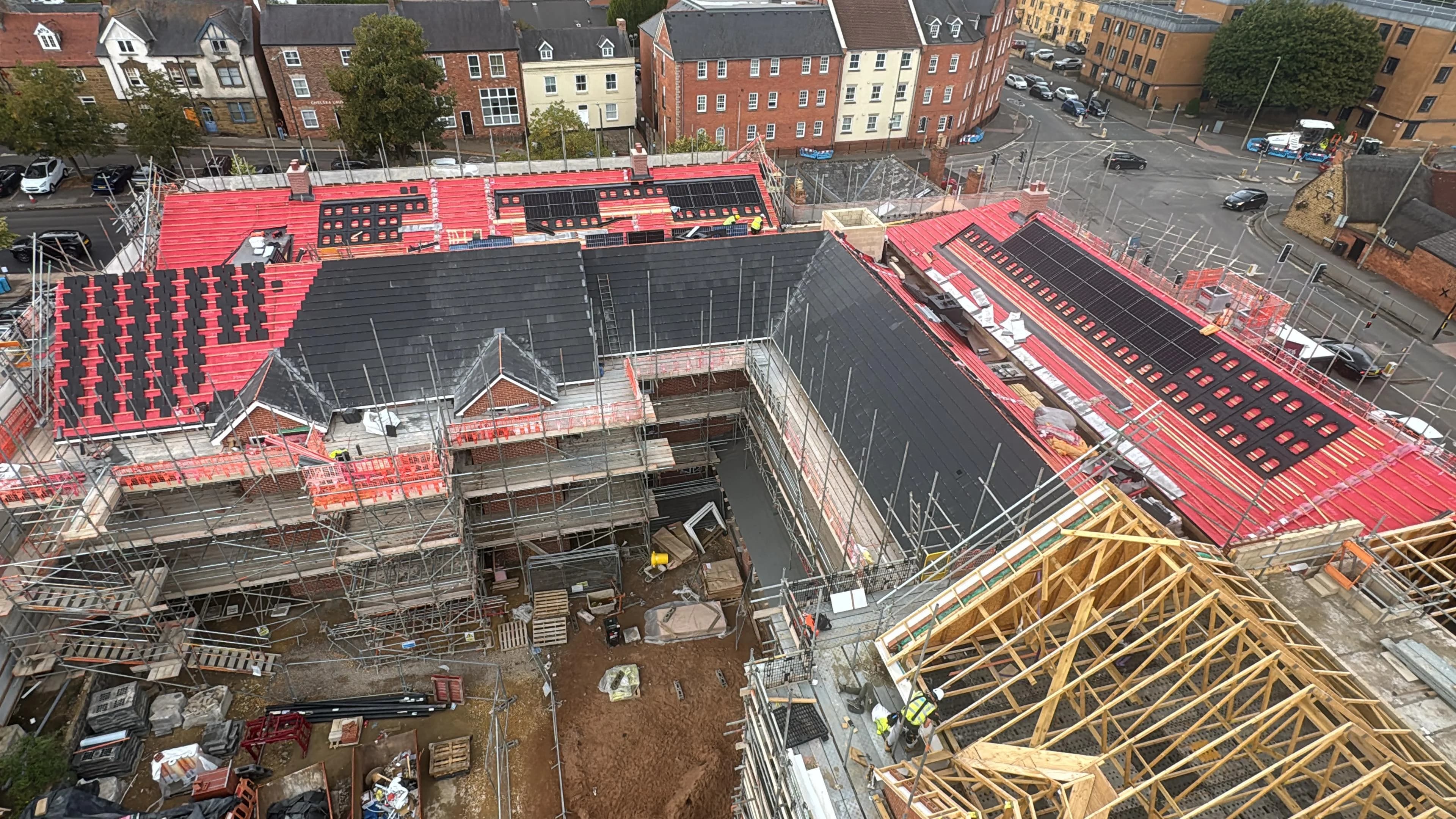Aerial view of a large commercial roof being re-covered